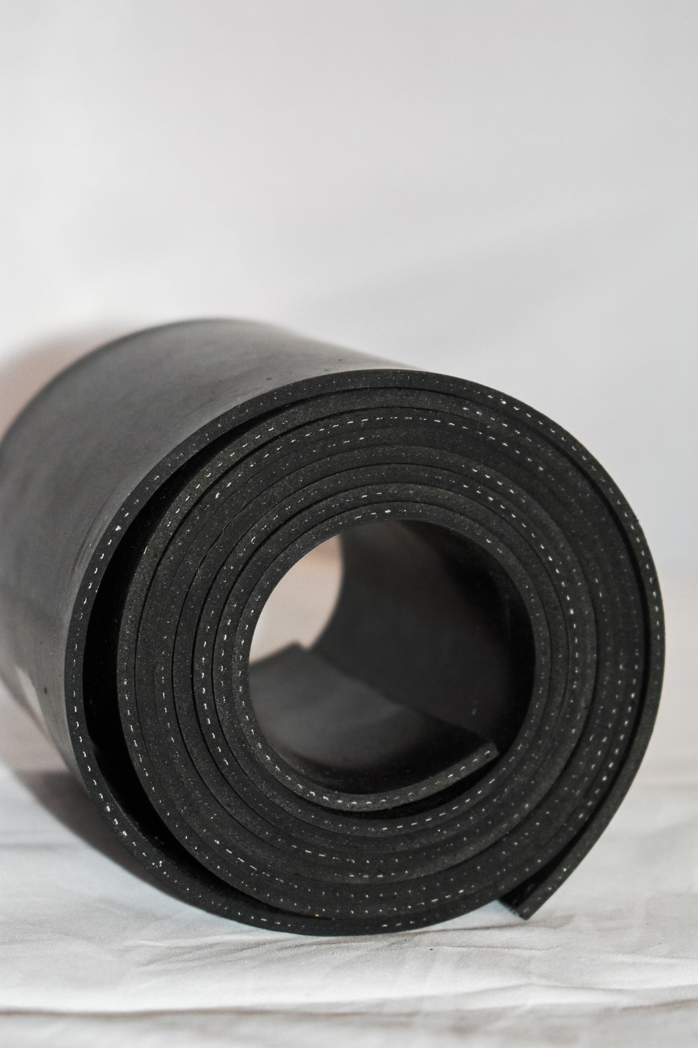 Reinforced shop rubber sheet